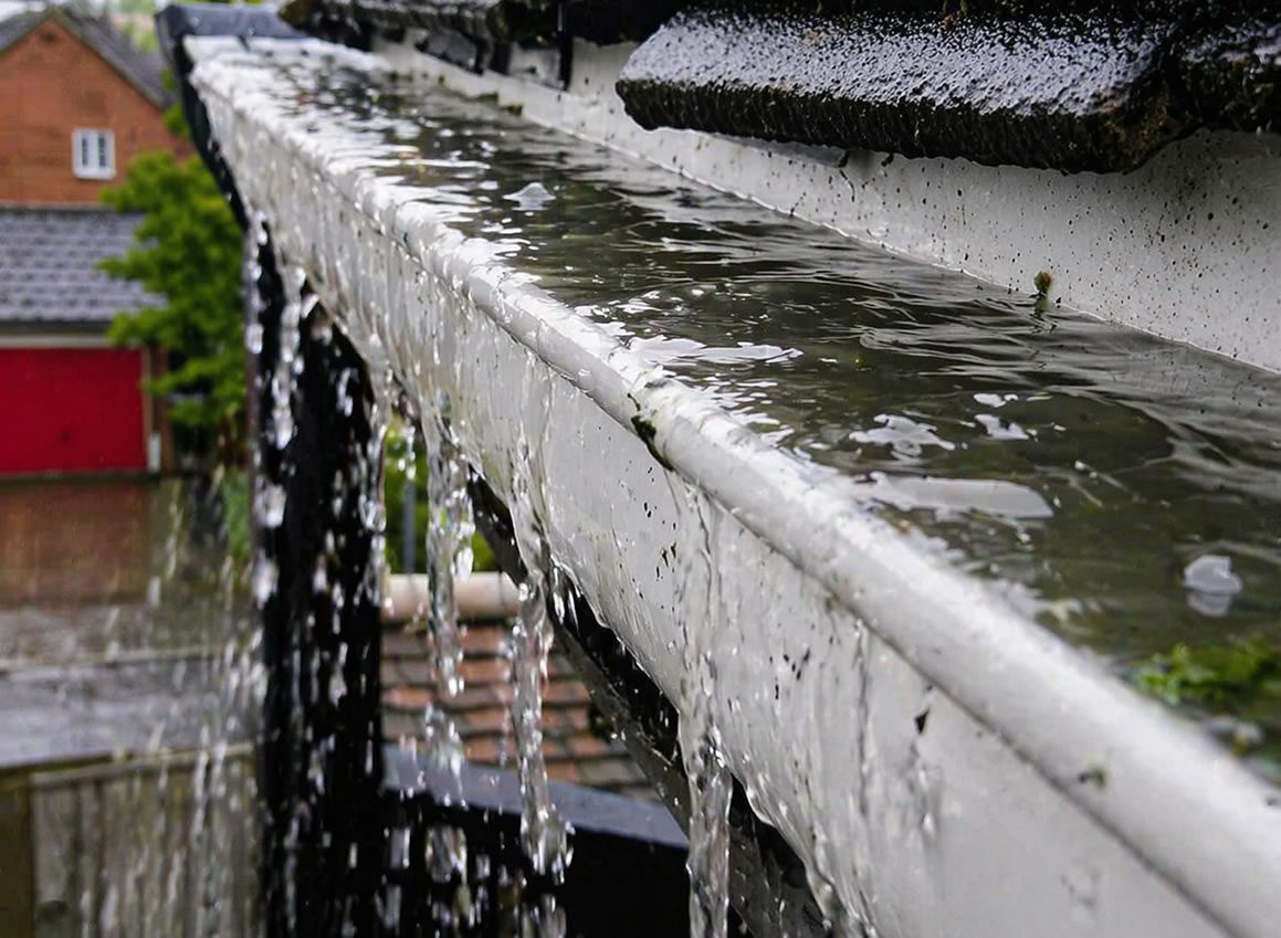 overflowing guttering damage wall